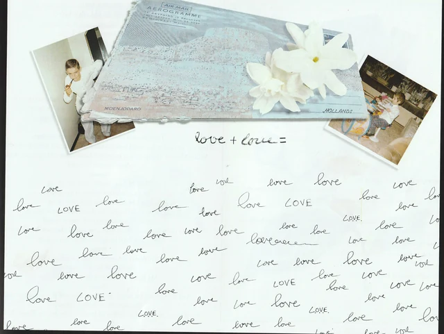 Photographs and white flowers above repeated handwritten lines of love.