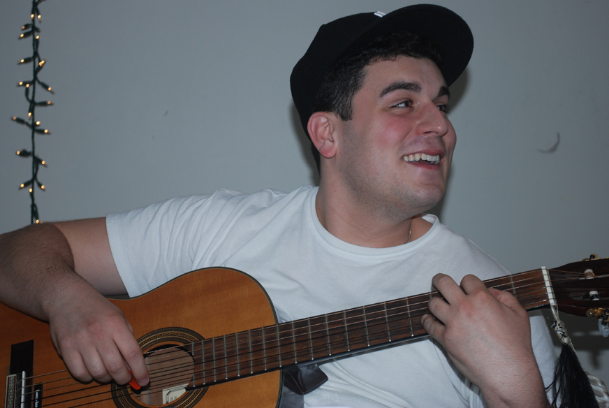 Danny Krug drummer archive photo with guitar